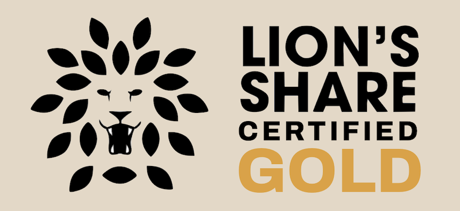 Icon showing a roaring lion and the writing Lion's Share Coffee Certified
